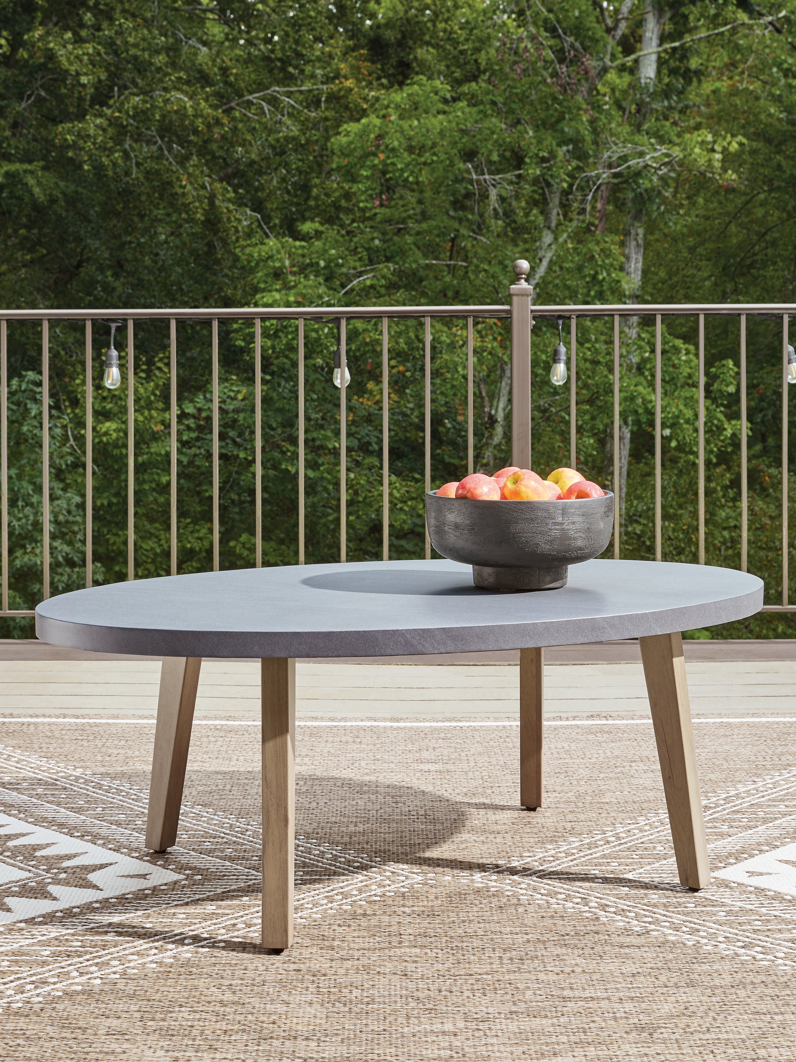 Warmstead Furniture - Ashley Furniture - Harmony Headlands Outdoor - Oval Cocktail Table / Natural/Gray - PCP428-701