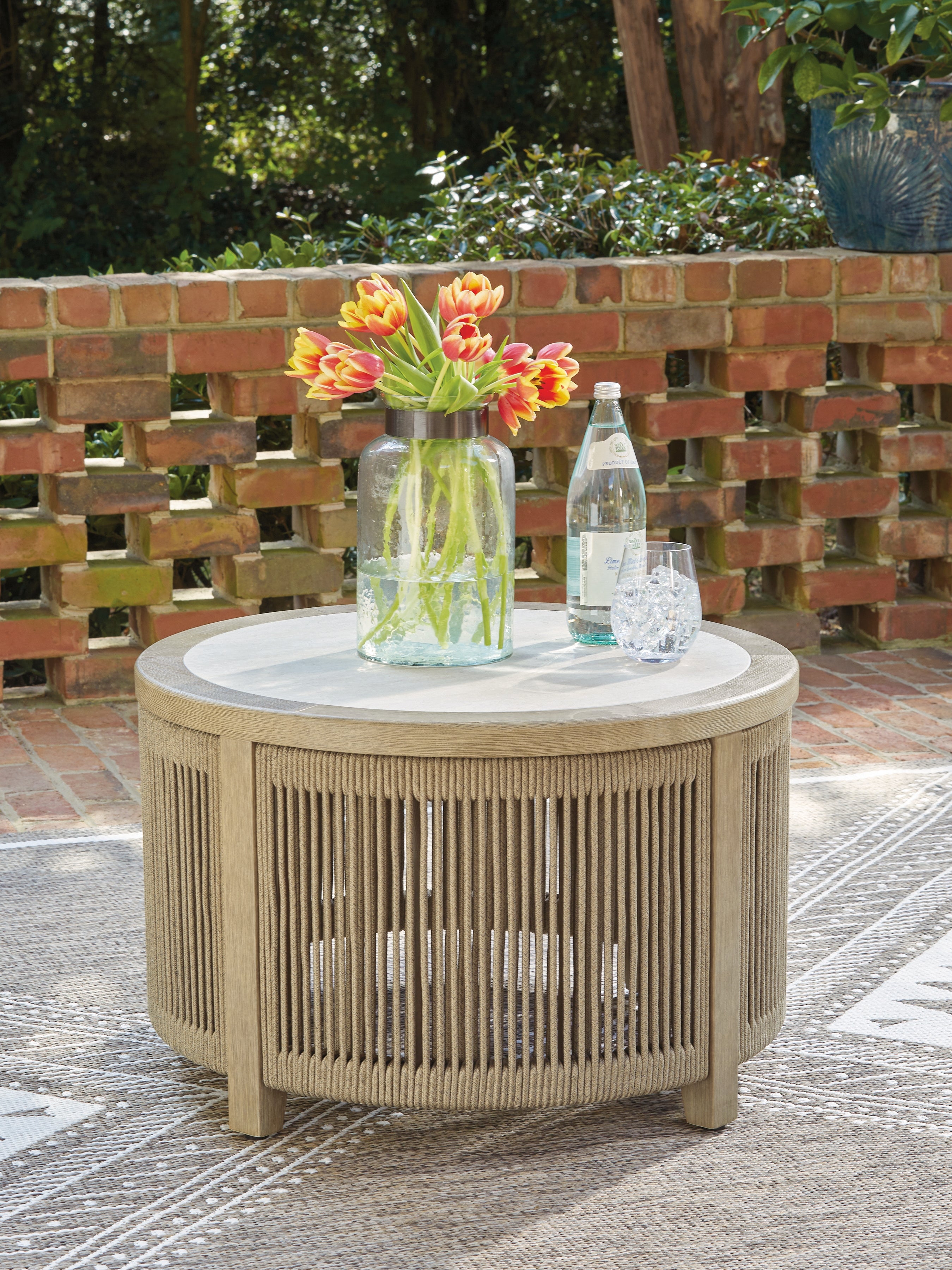 Warmstead Furniture - Ashley Furniture - Spooners Cove Outdoor - Round Cocktail Table / Beige - PCP469-708