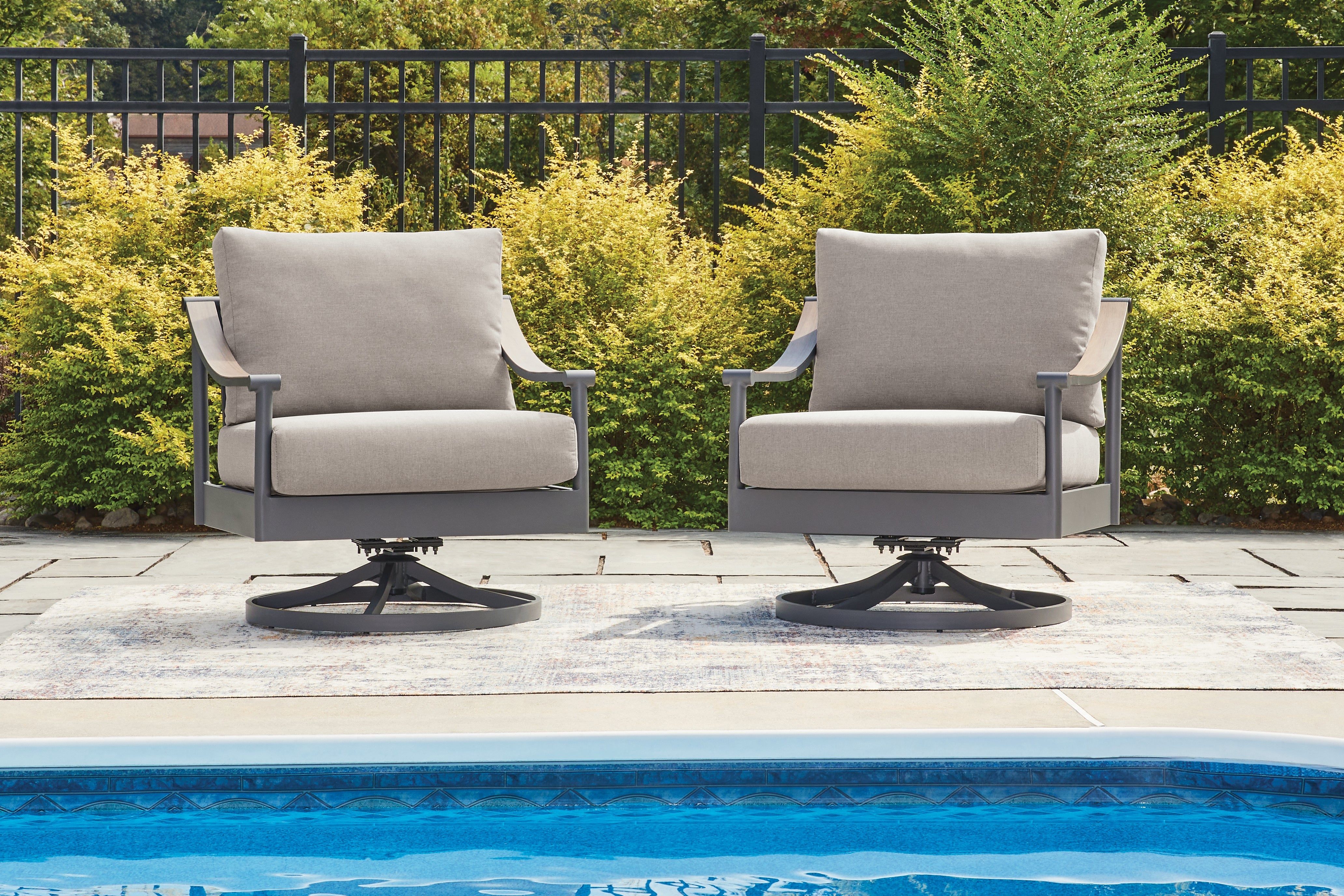Warmstead Furniture - Ashley Furniture - Ocean Beach Outdoor - Swivel Lounge w/ Cushion / Gray - PCP510-821