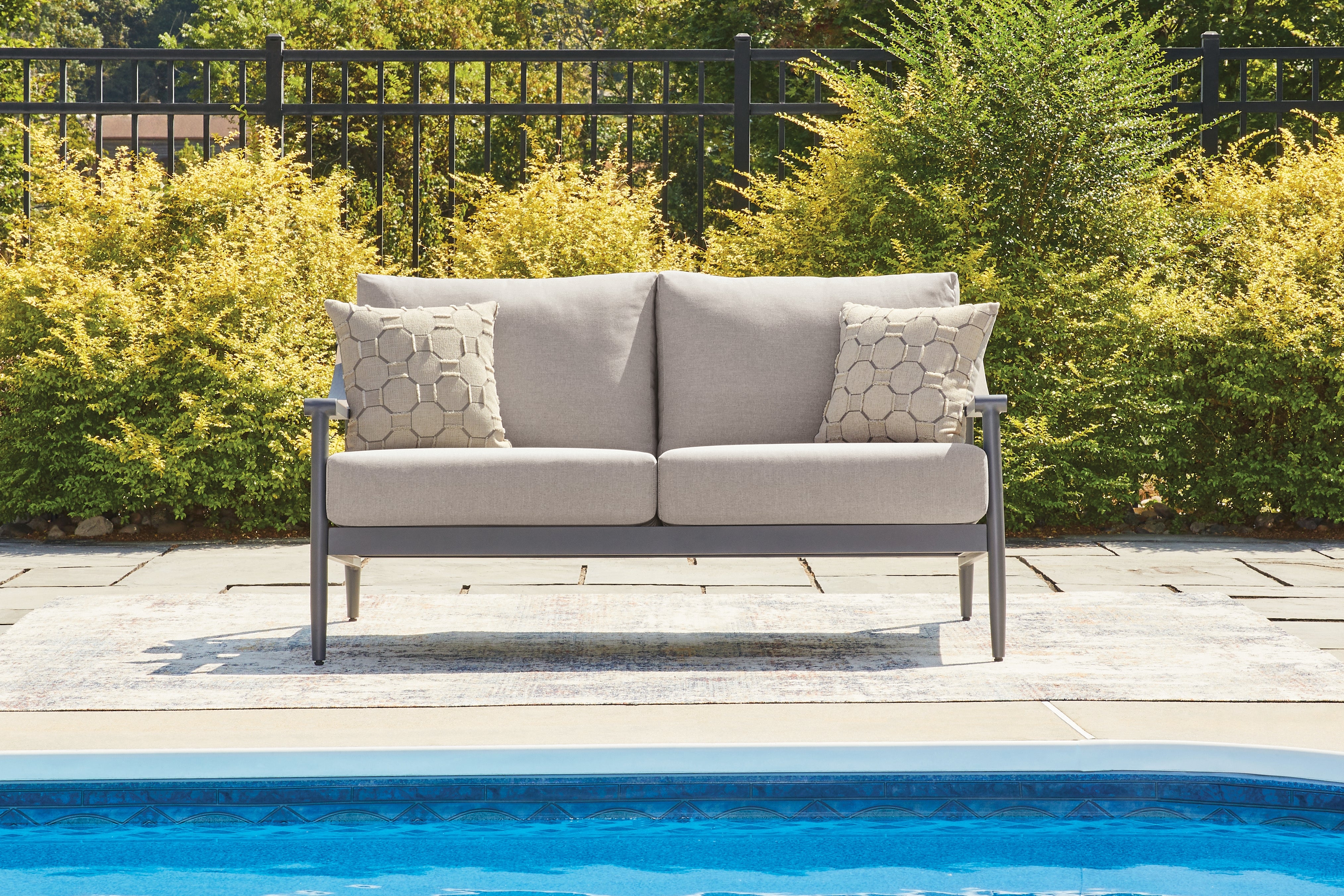 Warmstead Furniture - Ashley Furniture - Ocean Beach Outdoor - Loveseat w/Cushion / Gray - PCP510-835