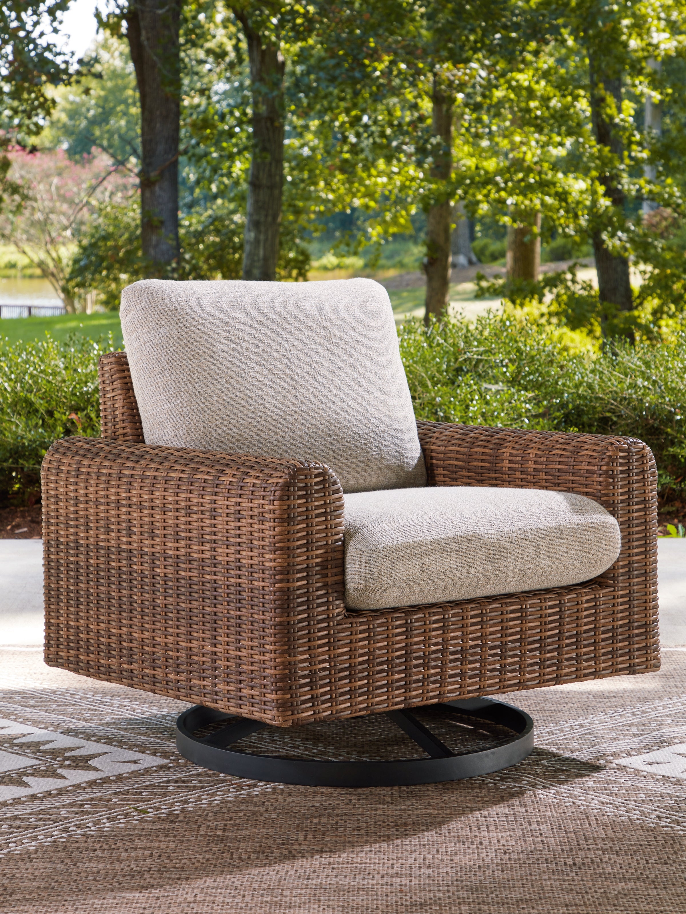 Warmstead Furniture - Ashley Furniture - Dolan Creek Outdoor - Swivel Lounge w/ Cushion / Gray/Brown - PCP610-821