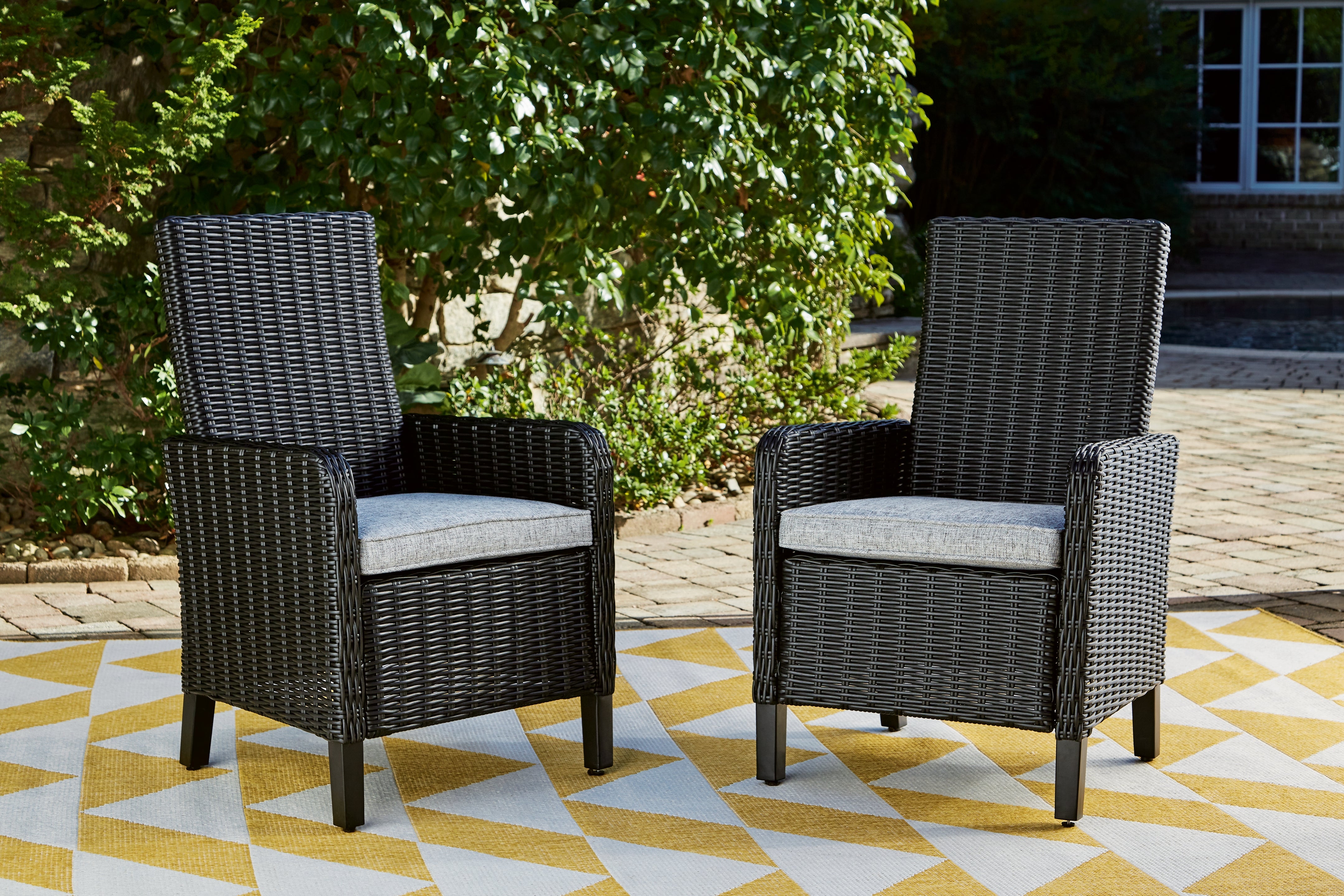 Warmstead Furniture - Ashley Furniture - Beachcroft Outdoor - Arm Chair With Cushion (Set of 2) / Black/Light Gray - P792-601A