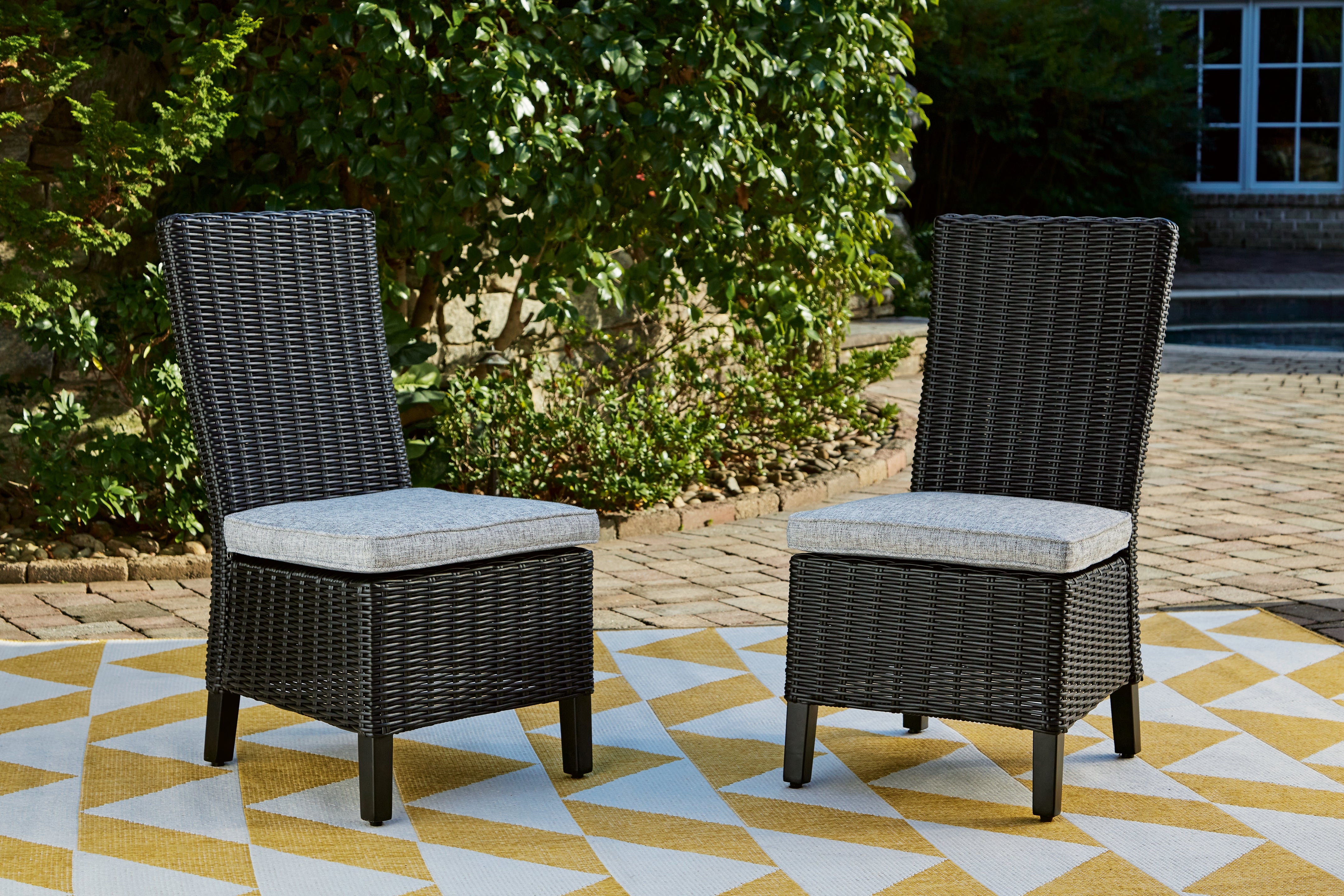 Warmstead Furniture - Ashley Furniture - Beachcroft Outdoor - Side Chair with Cushion (Set of 2) / Black/Light Gray - P792-601