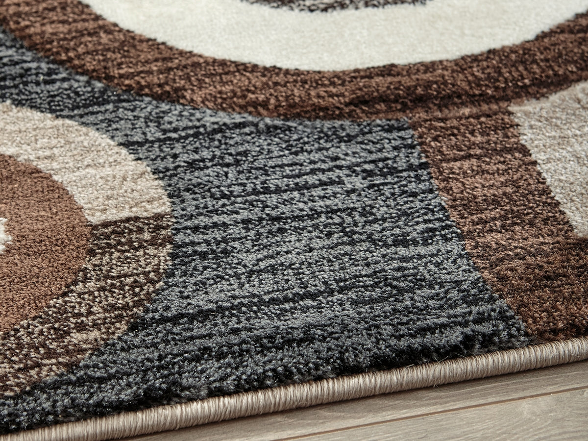 Warmstead Furniture - Ashley Furniture - Guintte Rug - 8'2" x 9'6" Rug / Multi - R403971
