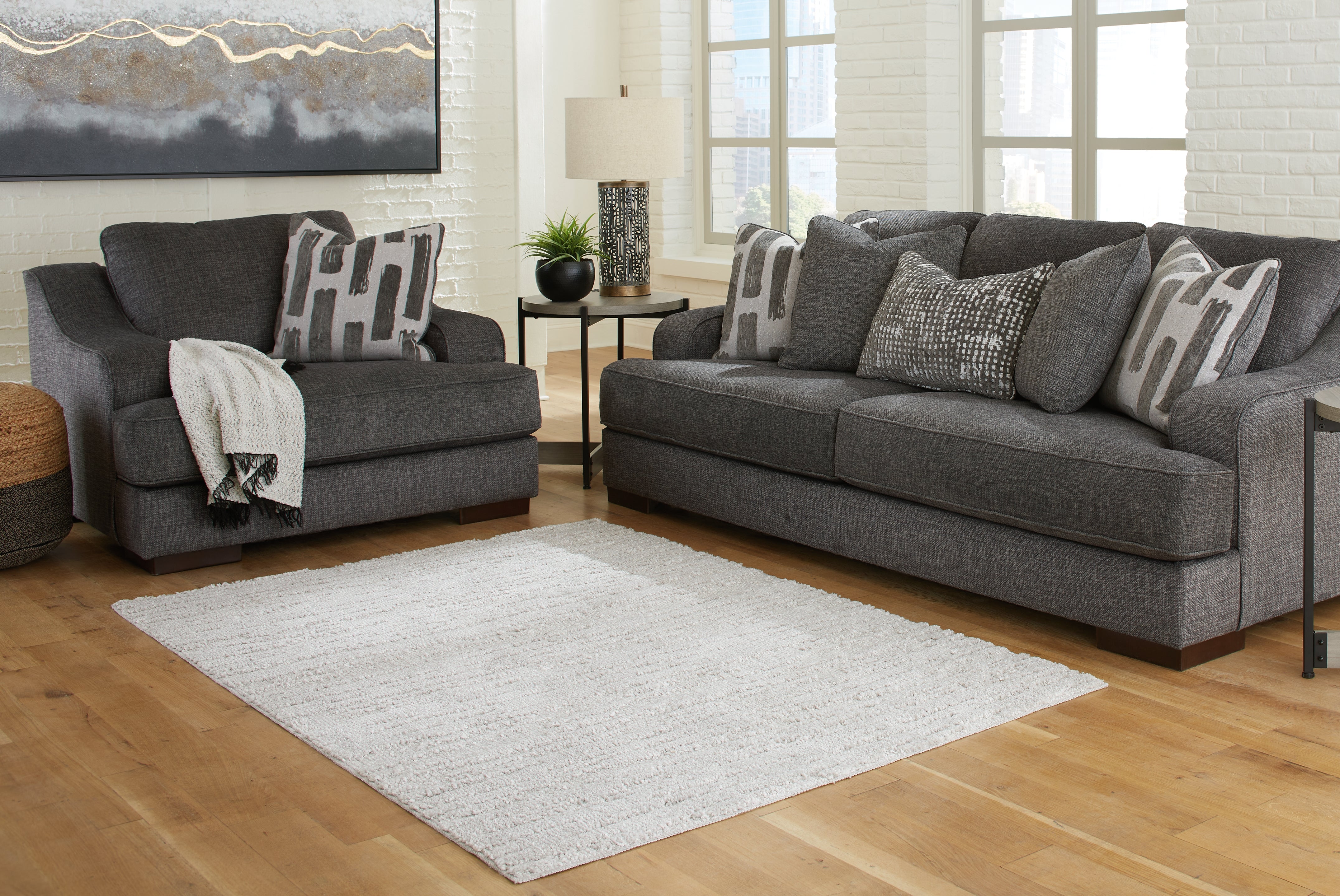 Warmstead Furniture - Ashley Furniture - Ivygail Rug - 5' x 7' Rug / Gray - R404512