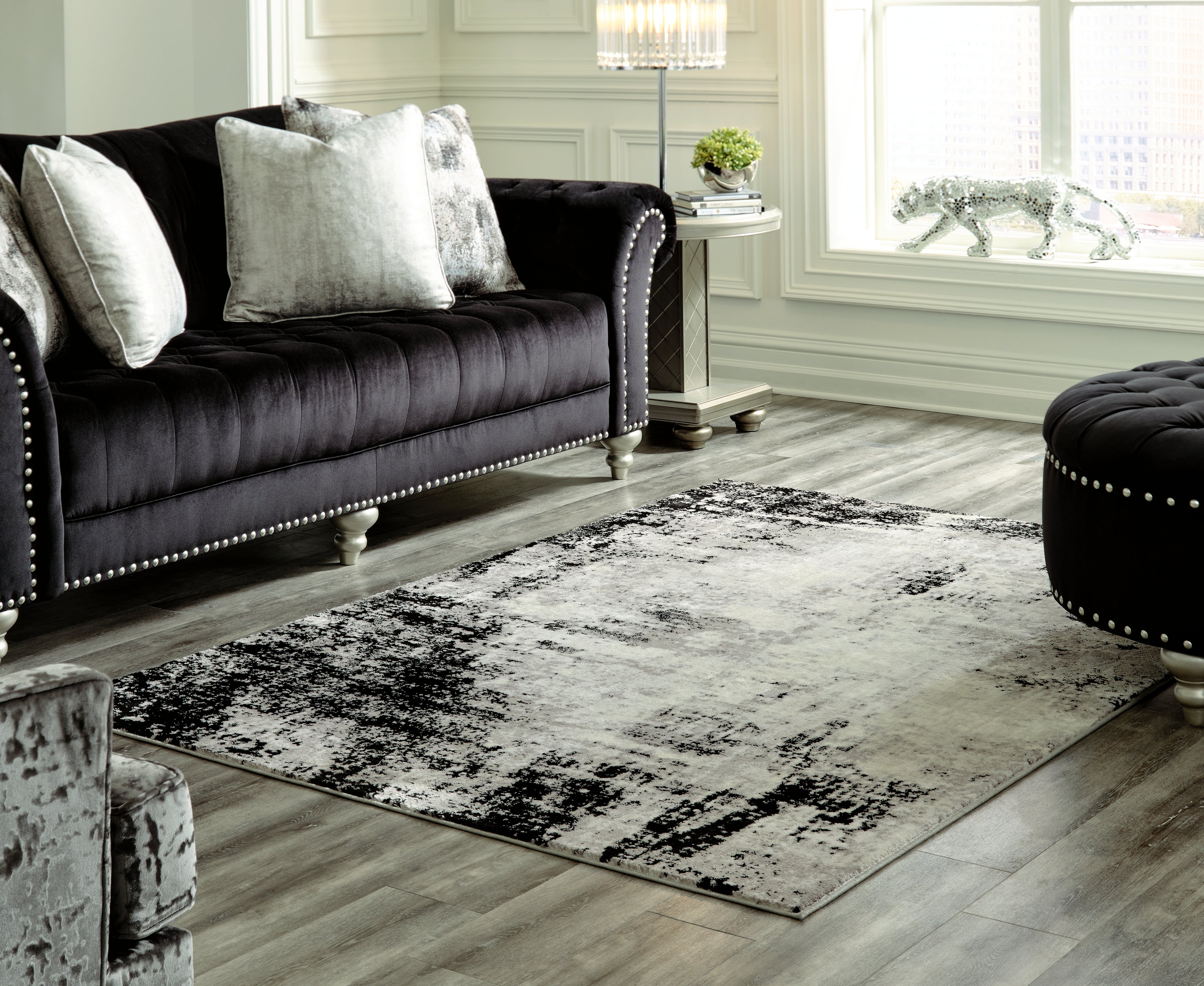 Warmstead Furniture - Ashley Furniture - Zekeman Rug - 7'10" x 10' Rug / Black/Cream/Gray - R404921