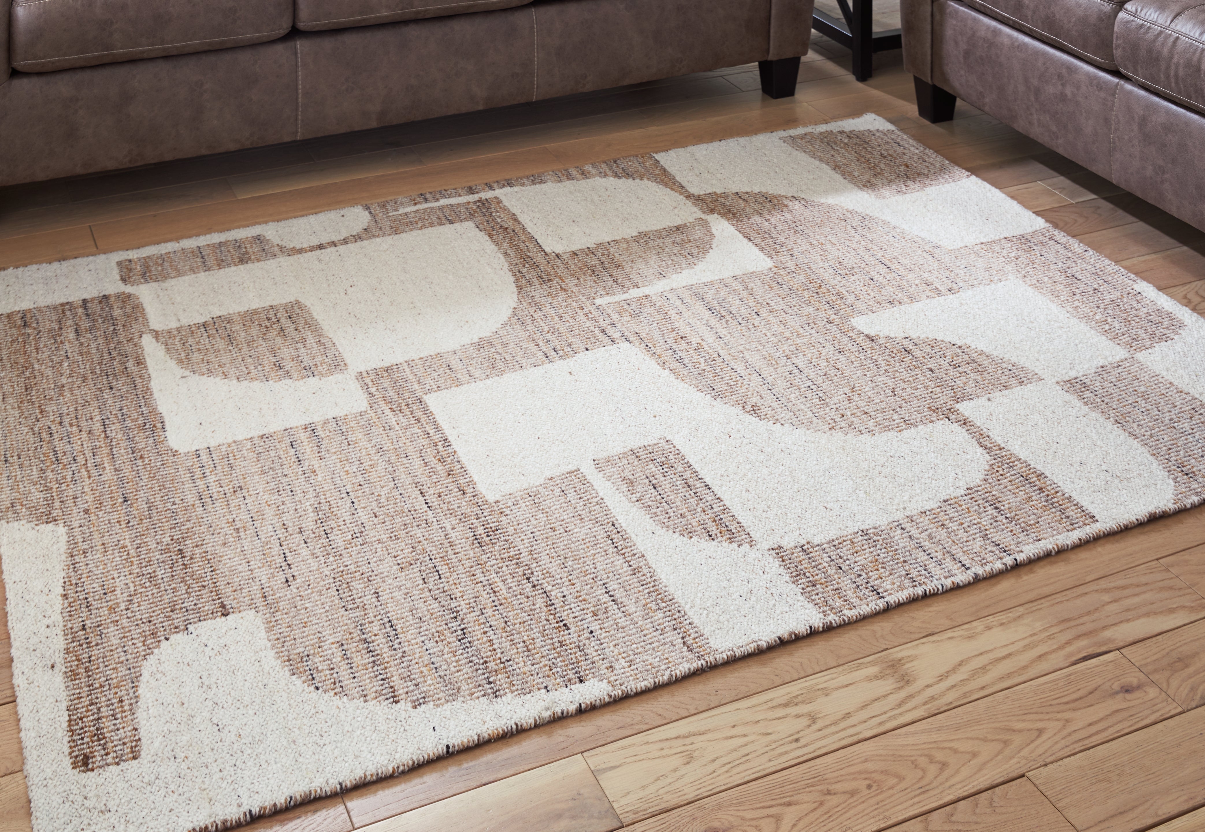 Warmstead Furniture - Ashley Furniture - Brynnfield Rug - 5' x 7' Rug / Beige/Brown - R406372
