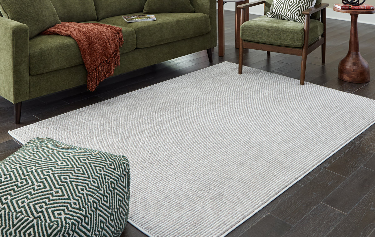 Warmstead Furniture - Ashley Furniture - Eduring Rug - 5' x 7' Rug / Ivory/Taupe - R406692