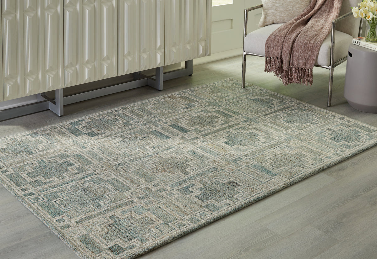 Warmstead Furniture - Ashley Furniture - Jossland Rug - 8' x 10' Rug / Green/Ivory - R406911