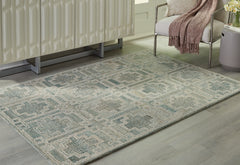 Warmstead Furniture - Ashley Furniture - Jossland Rug - 8' x 10' Rug / Green/Ivory - R406911
