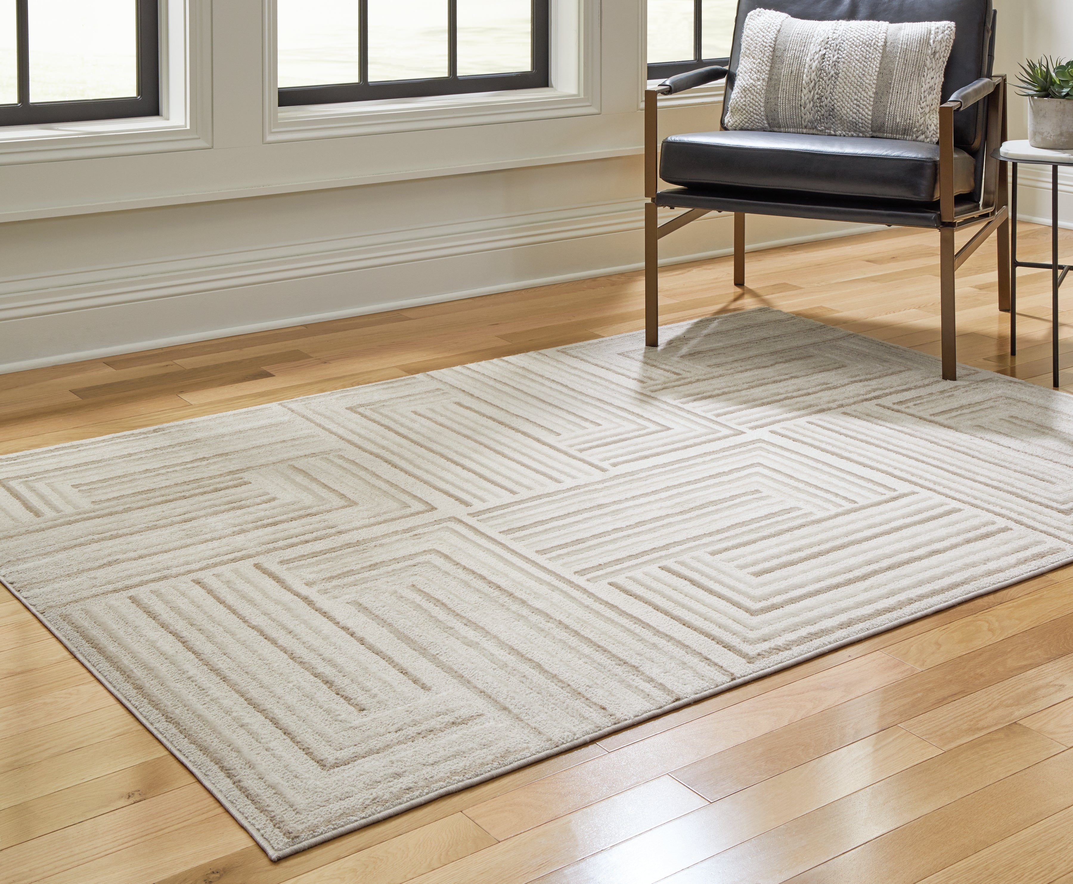 Warmstead Furniture - Ashley Furniture - Darmondard Rug - 5' x 7' Rug / Cream/Taupe - R406942