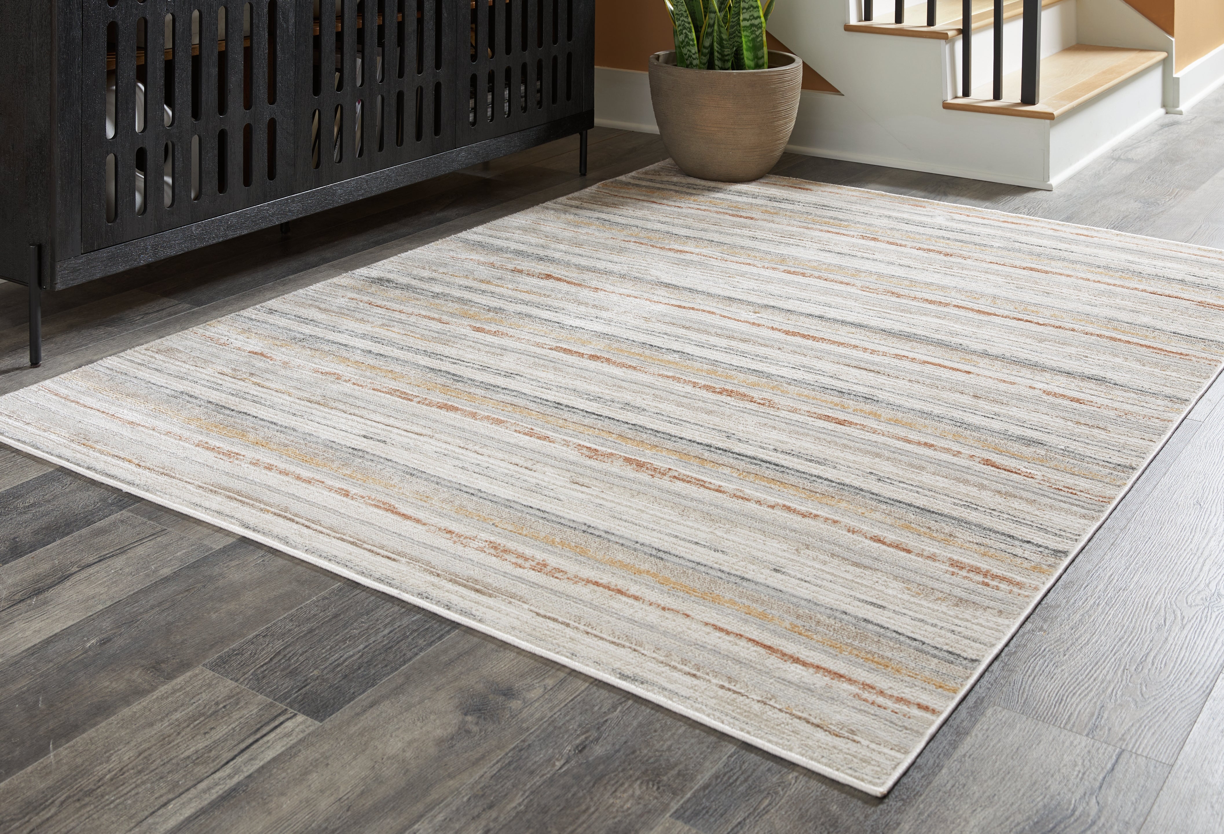 Warmstead Furniture - Ashley Furniture - Artney Rug - 5' x 7' Rug / Multi - R407022