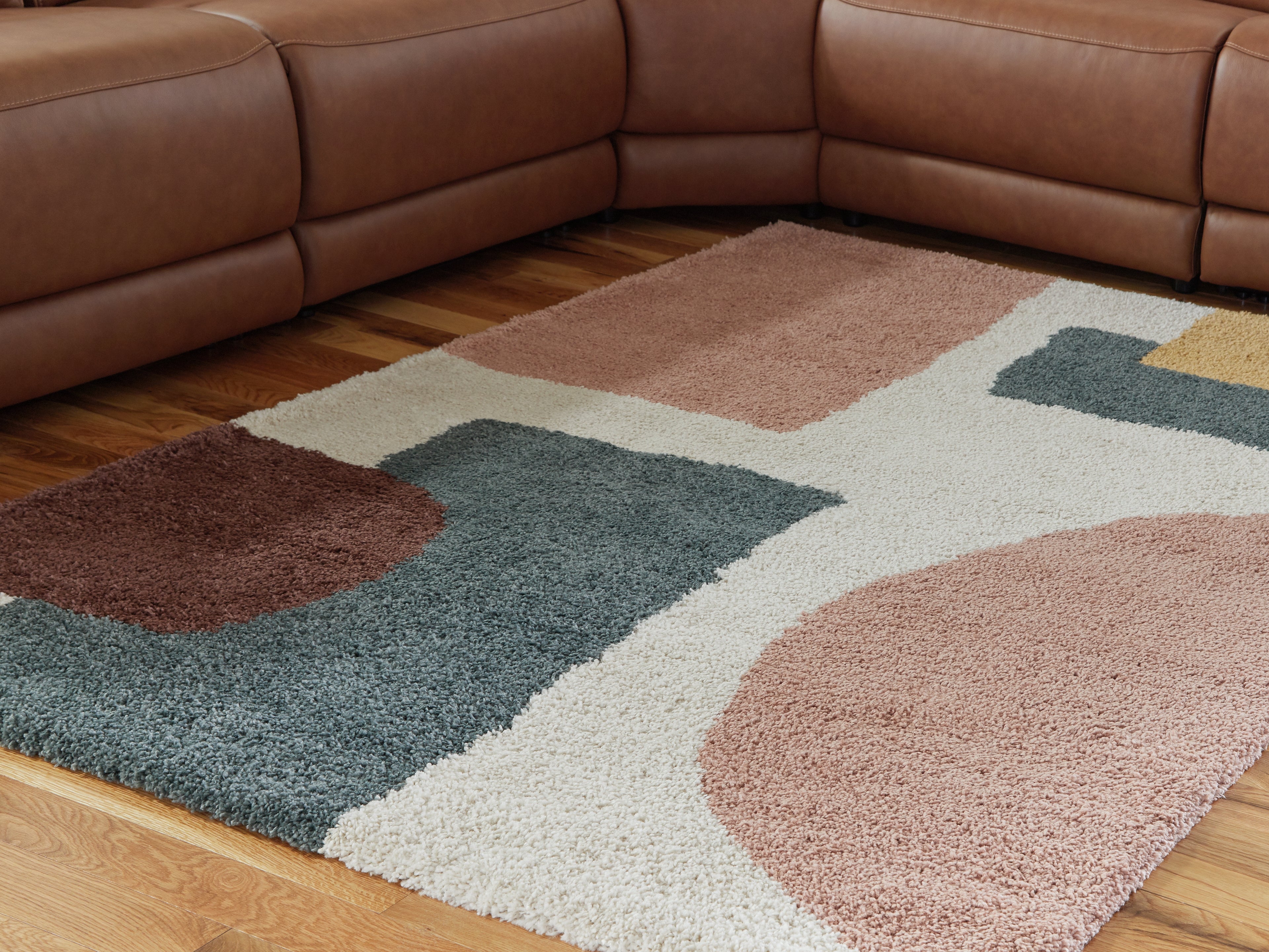 Warmstead Furniture - Ashley Furniture - Flynnwick Rug - 5' x 7' Rug / Cream/Pink/Gray - R407182