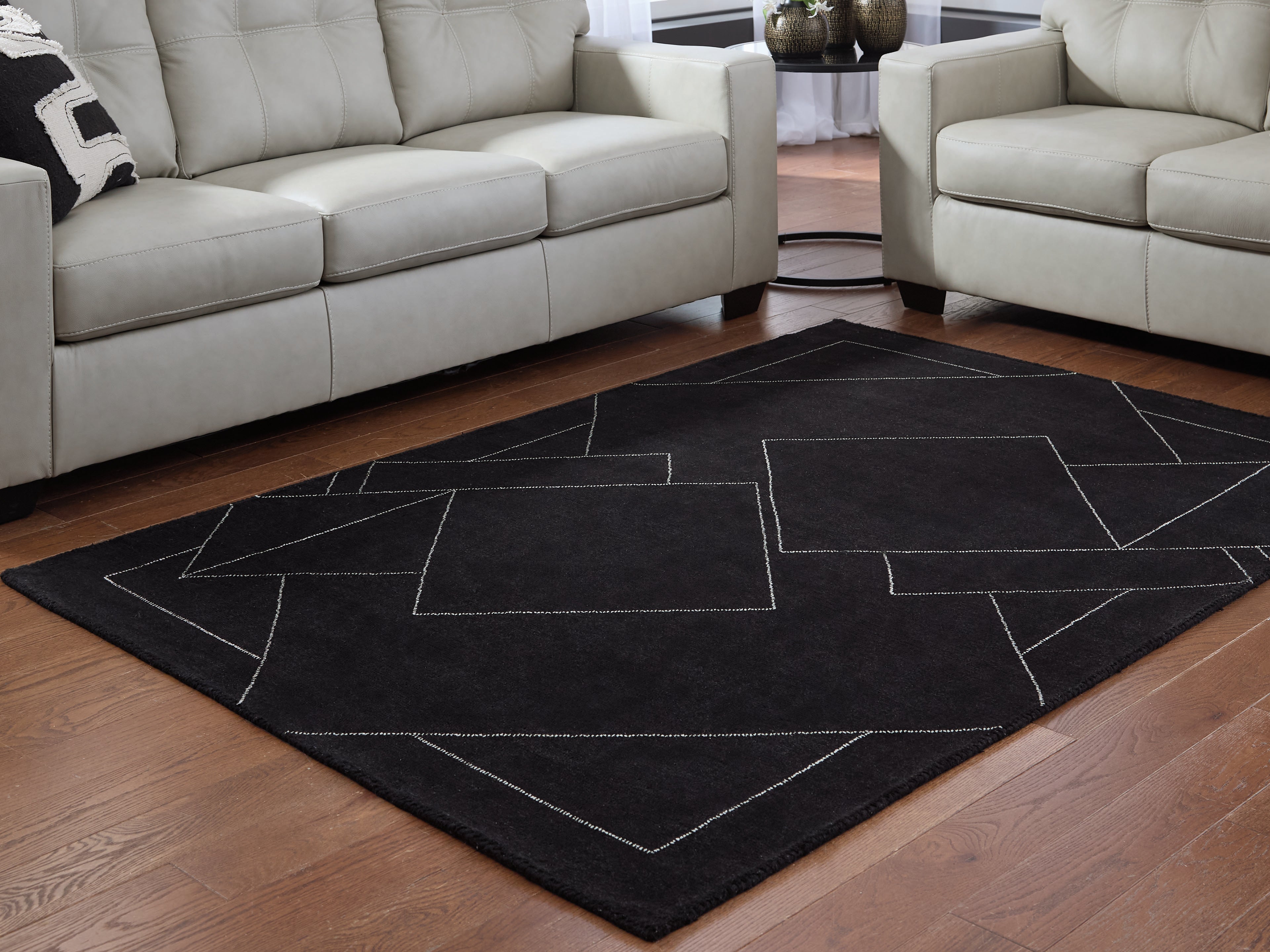 Warmstead Furniture - Ashley Furniture - Marav Rug - 5' x 7' Area Rug / Black/White - R407532