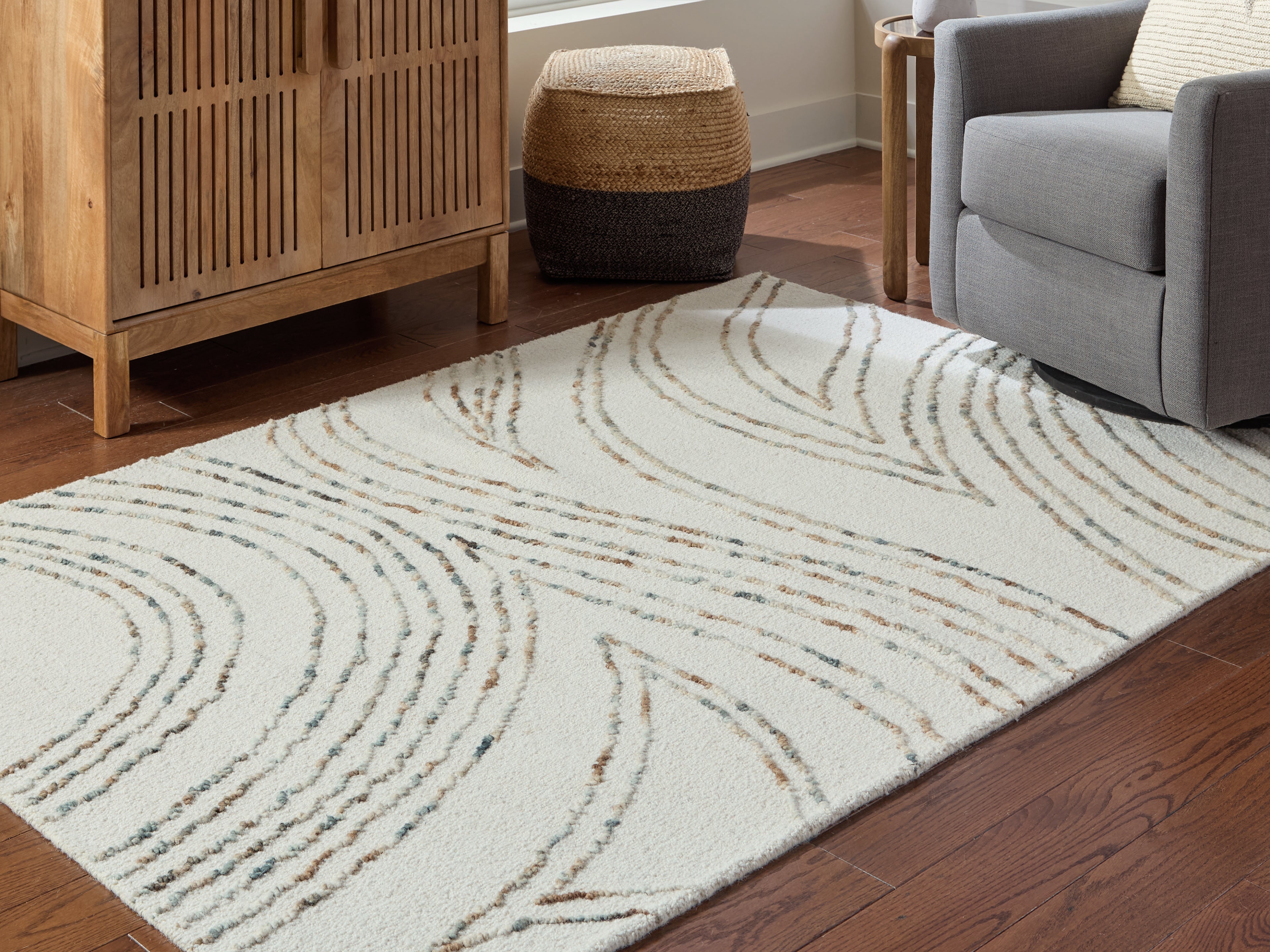 Warmstead Furniture - Ashley Furniture - Deenbury Rug - 5' x 7' Area Rug / Ivory/Green/Brown - R407862