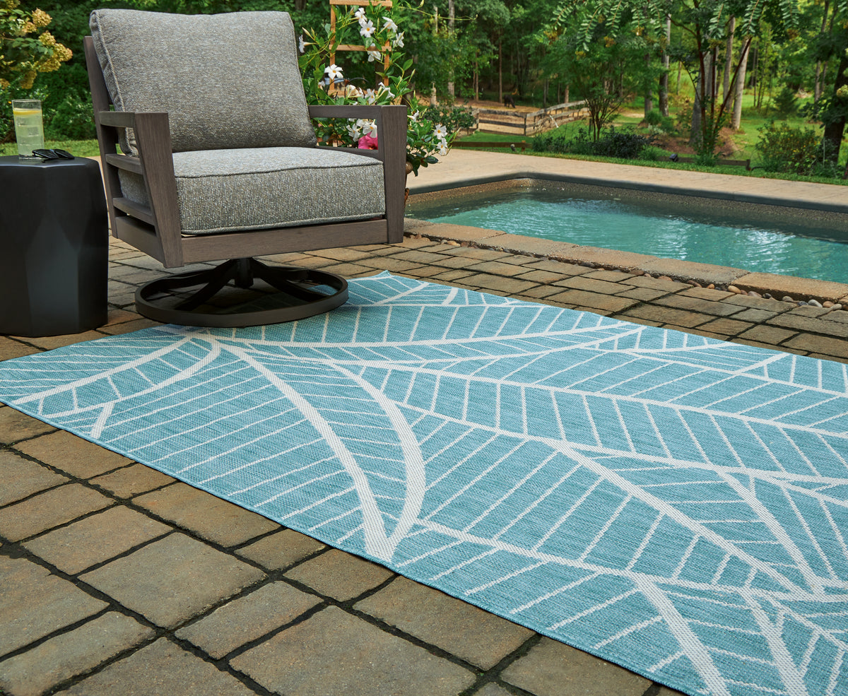 Warmstead Furniture - Ashley Furniture - Hulsia Rug - 5' x 7' Rug / Ivory/Aqua - R900122