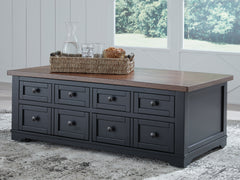 Warmstead Furniture - Ashley Furniture - Wildenauer Lift-Top Coffee Table - Lift Top Cocktail Table / Brown/Black - T664-9