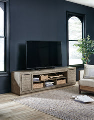 Warmstead Furniture - Ashley Furniture - Krystanza 92" TV Stand - 92" / Weathered Gray - W760-78